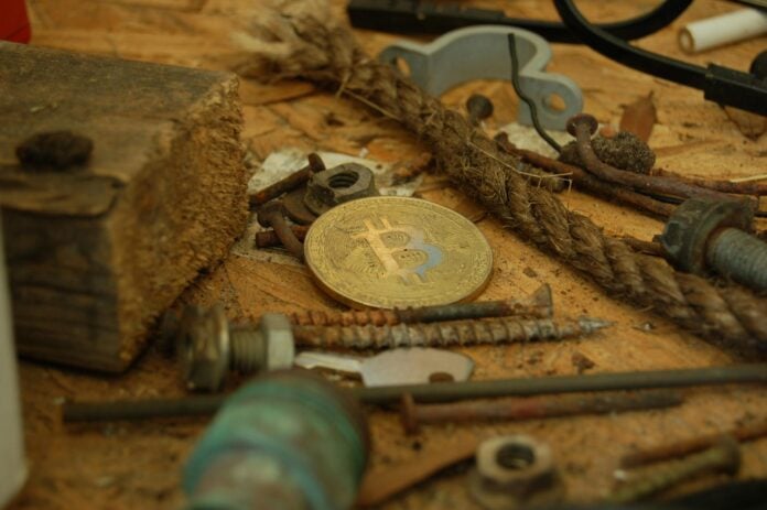 crypto coin in the dirt dust