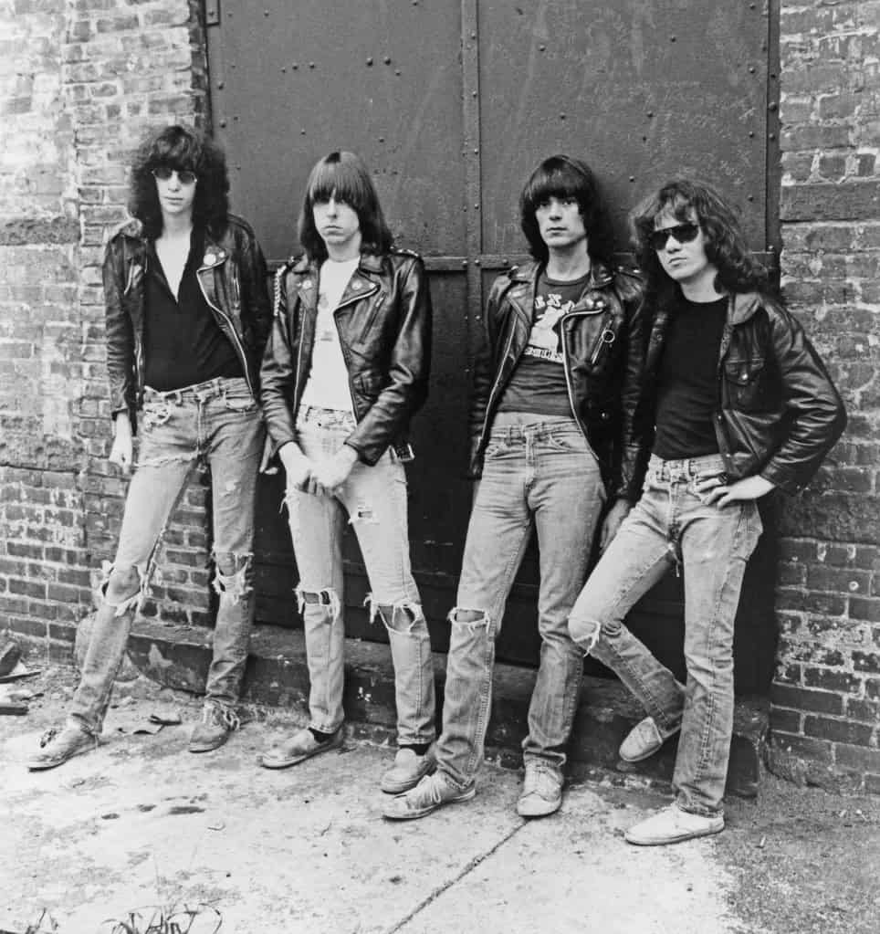 The Ramones band members Joey, Johnny, Dee Dee, and Tommy posing for their 1977 album cover.