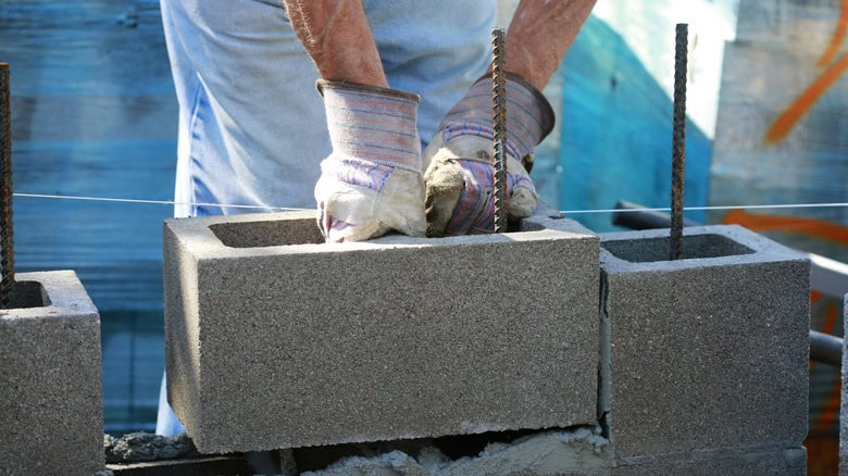 Garden bench made with concrete blocks and wood planks