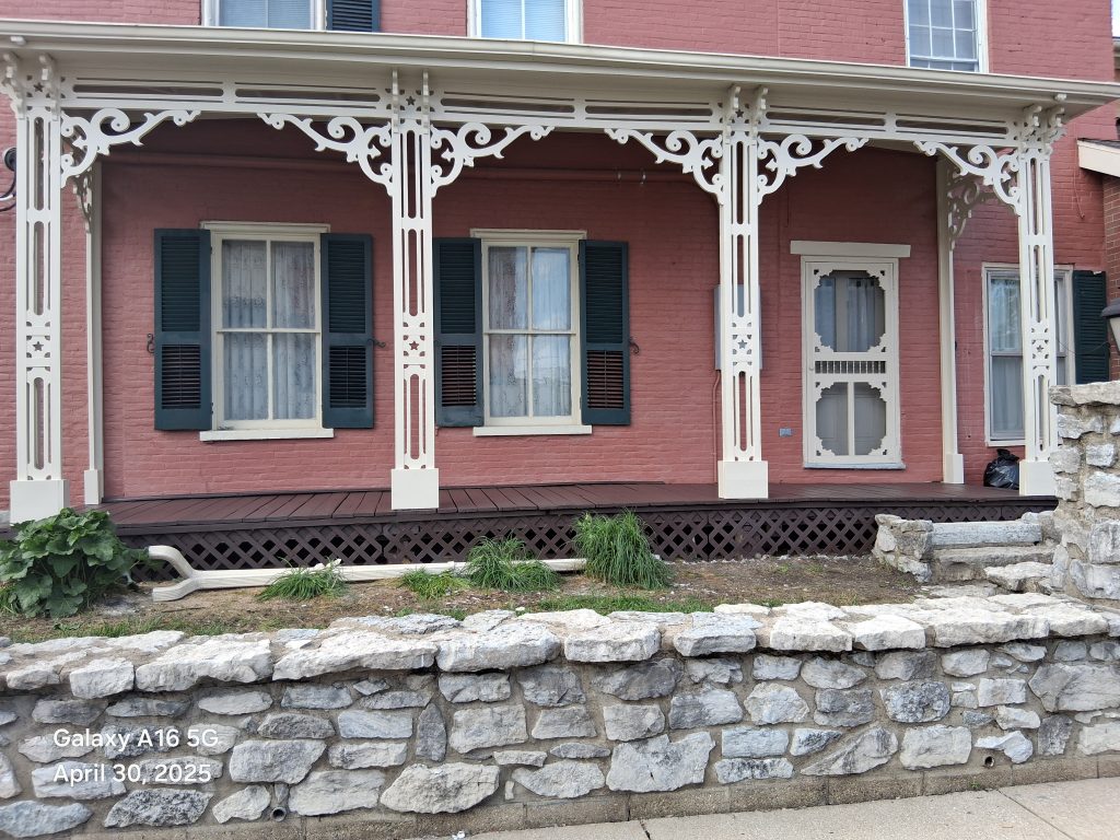 Beautifully restored Victorian house with fresh exterior paint and decorative trim. Perfect for enha.