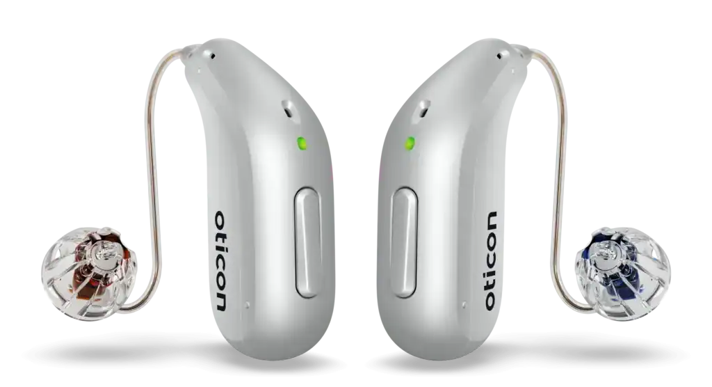 Modern behind-the-ear hearing aids with wireless features and customizable settings for improved hearing experience.