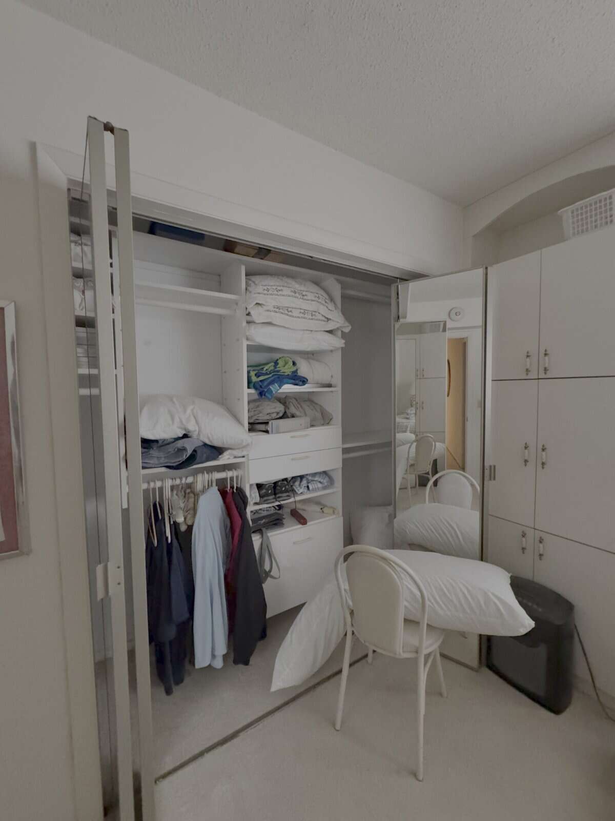 HOA bulletin board displaying rules and contact list