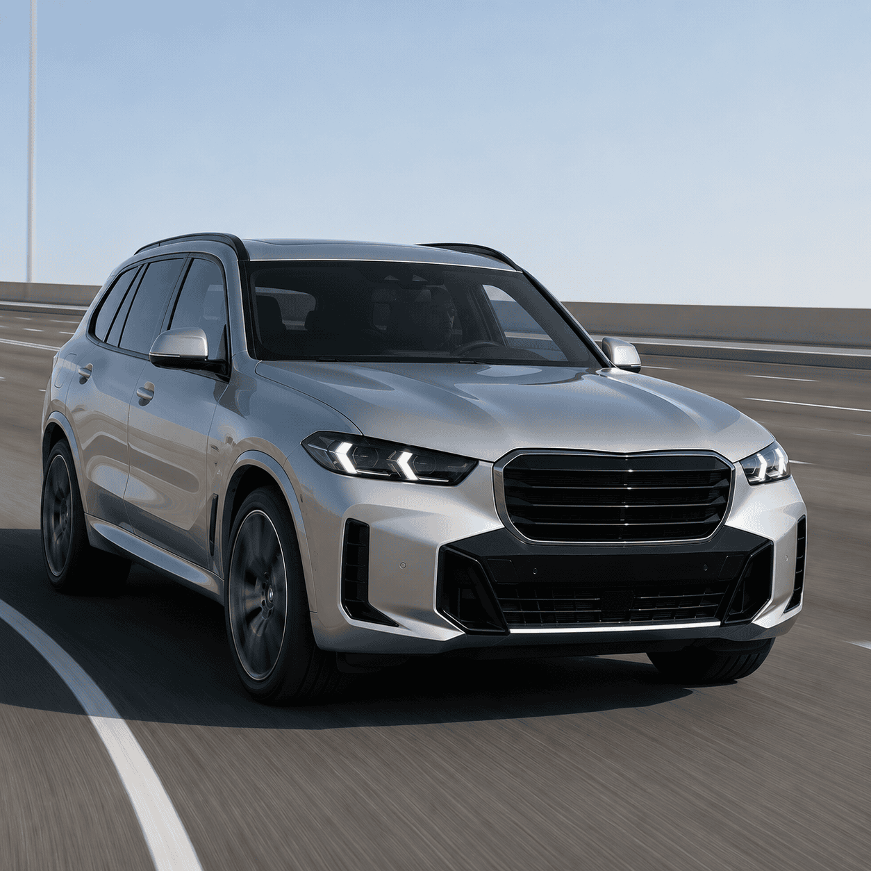 BMW X5 xDrive50e SUV on a dynamic highway drive