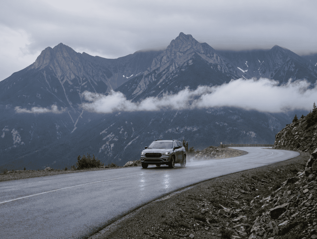 Jeep Compass Trailhawk Foggy mountain drive in rain