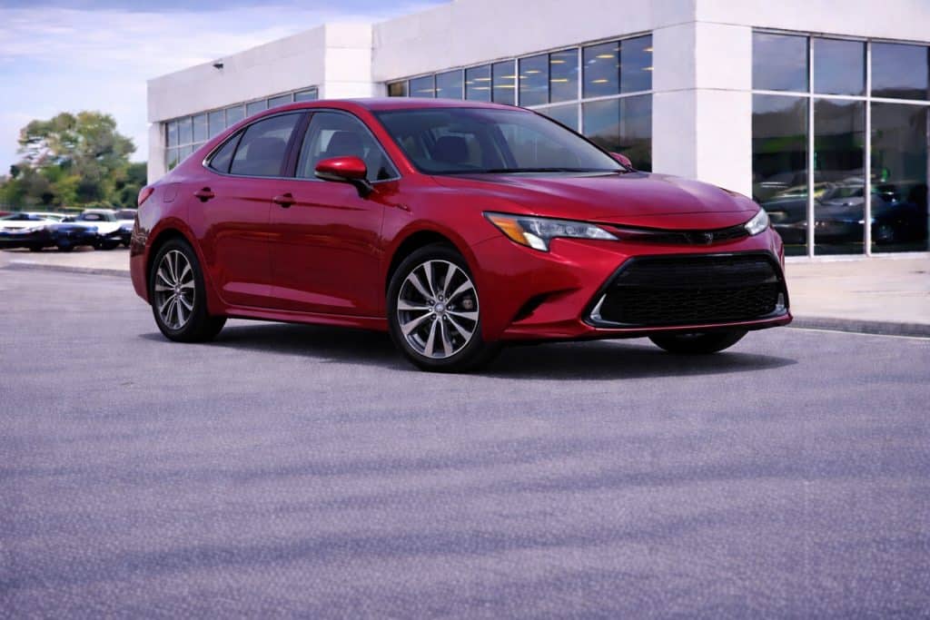 Sleek Ruby Flare Pearl Corolla Hybrid
