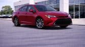 Sleek Ruby Flare Pearl Corolla Hybrid