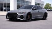 Sleek Audi RS 7 outside dealership