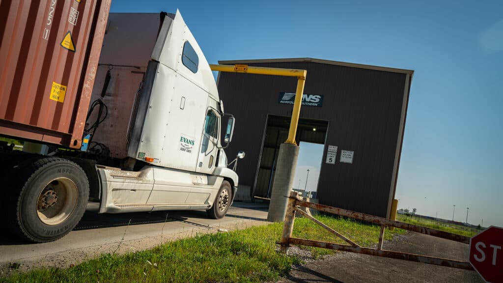 A semi truck from the Columbus Regional Airport Authority is parked in front of a building at John Glenn International.