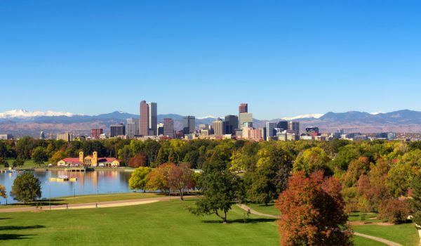 City,Skyline,Of,Denver,Colorado,Downtown,With,Snowy,Rocky,Mountains Denver, Colorado skyline during the day