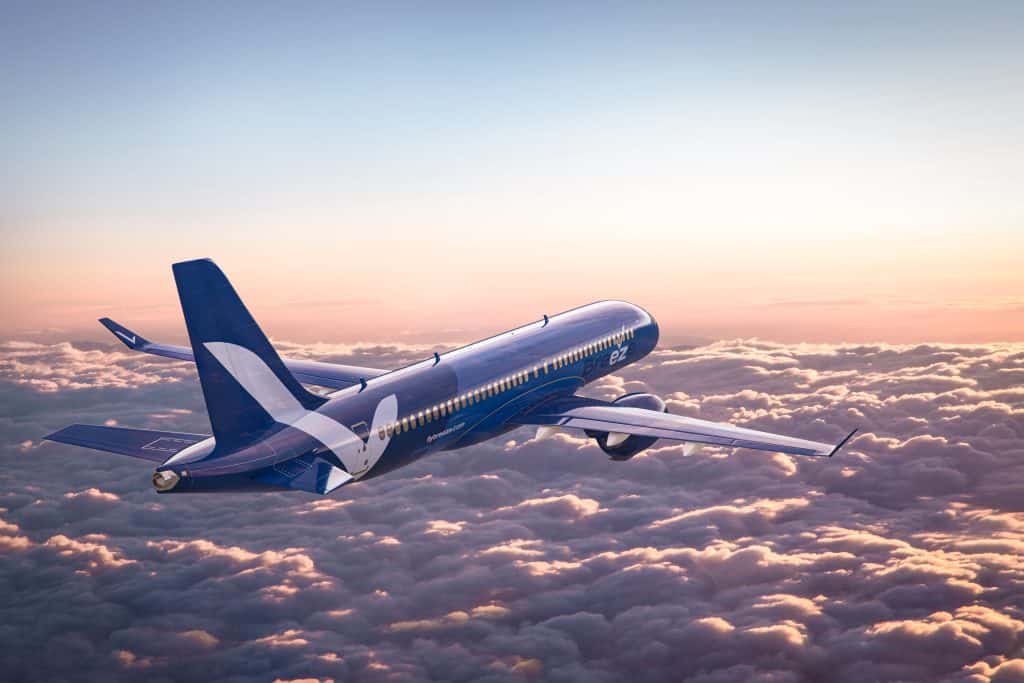 Breeze Airways A220 flying above the clouds
