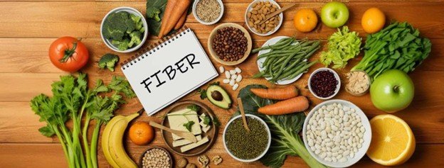 Healthy foods rich in dietary fiber including fruits, vegetables, and whole grains.