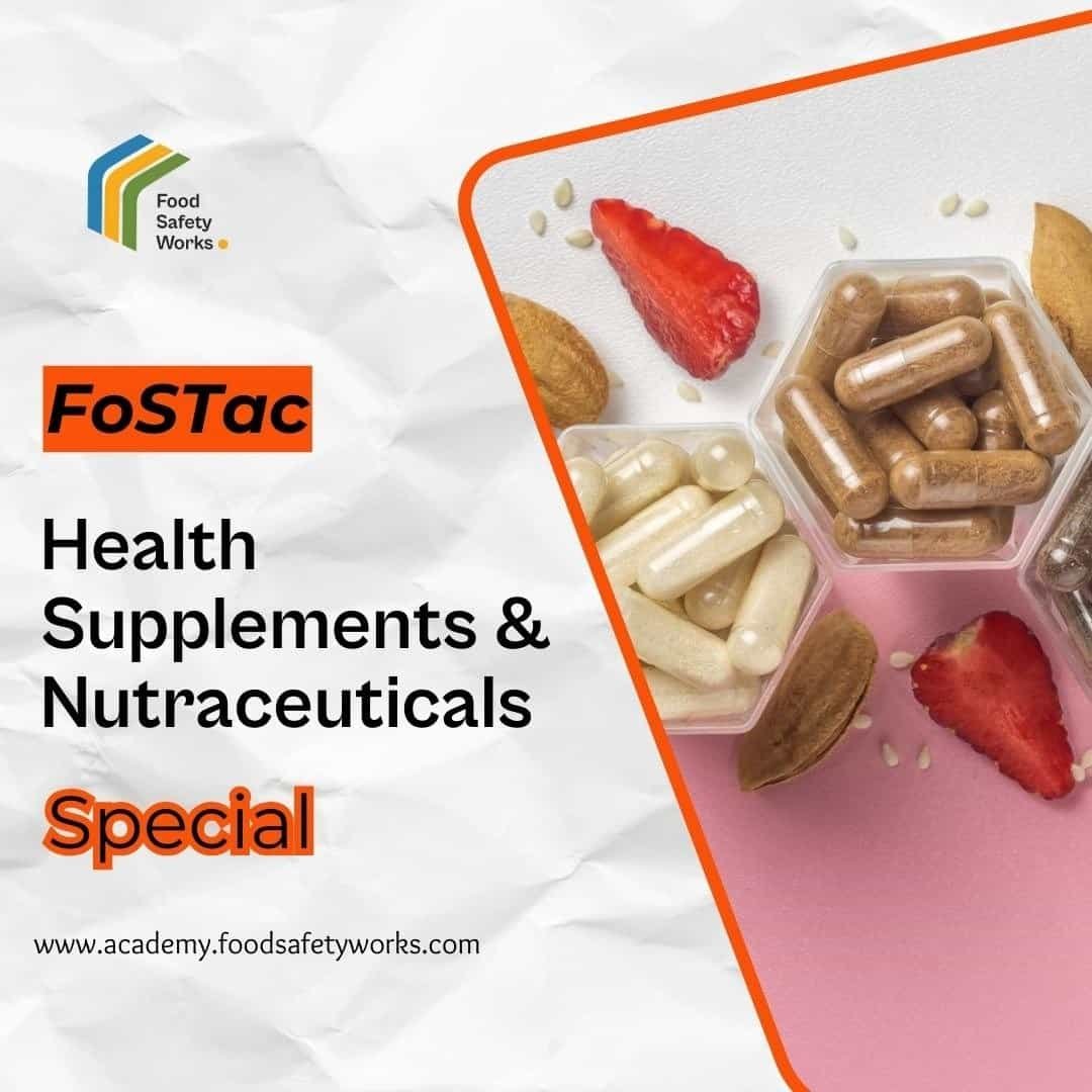 Assorted health supplements and nutraceutical capsules with strawberries and nuts on pink background.