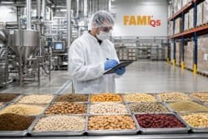 Food safety technician inspecting spices in a manufacturing facility.