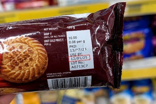 Close-up of food package showing expiry date and barcode.