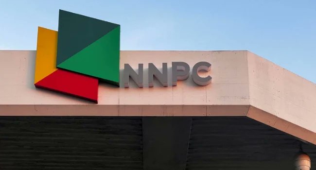 Nnpc logo on building exterior, Nigeria National Petroleum Corporation headquarters, oil and gas industry branding, corporate headquarters, energy sector infrastructure, Abuja, Nigeria.