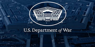 U.S. Department of War office building, aerial view, modern design, government facility, strategic military headquarters, complex architecture, urban infrastructure, drone perspective, security, federal administration.