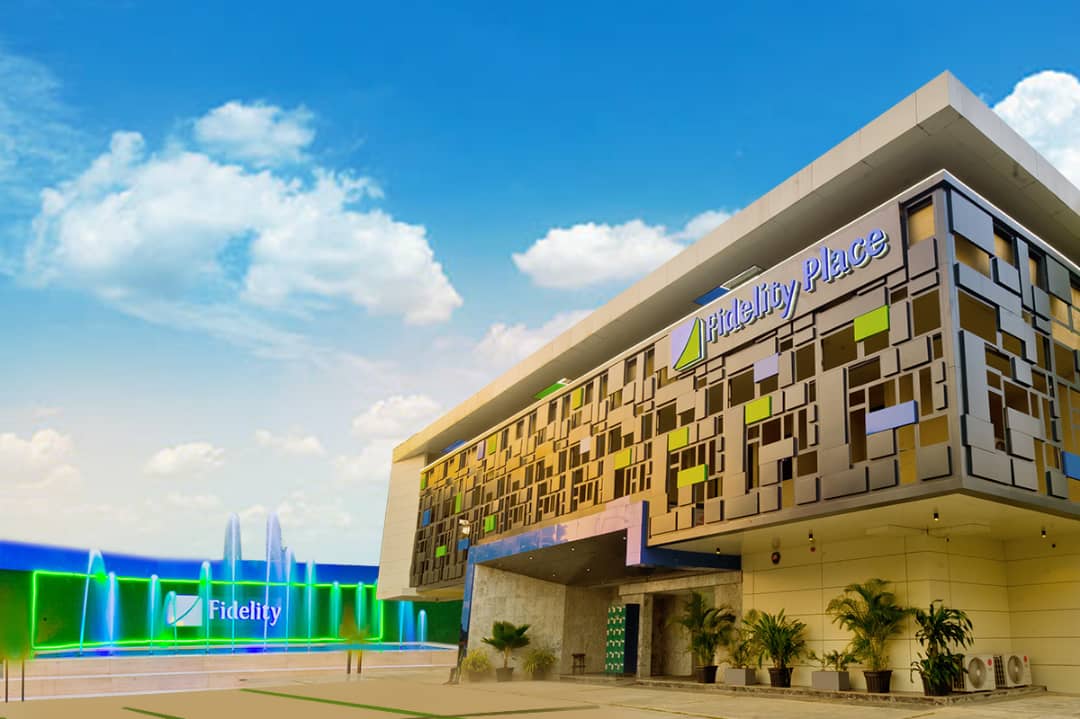 Modern Fidelity Place commercial building with innovative facade, vibrant greenery, and colourful fountains, illustrating a dynamic workspace environment and corporate headquarters in a contemporary cityscape.