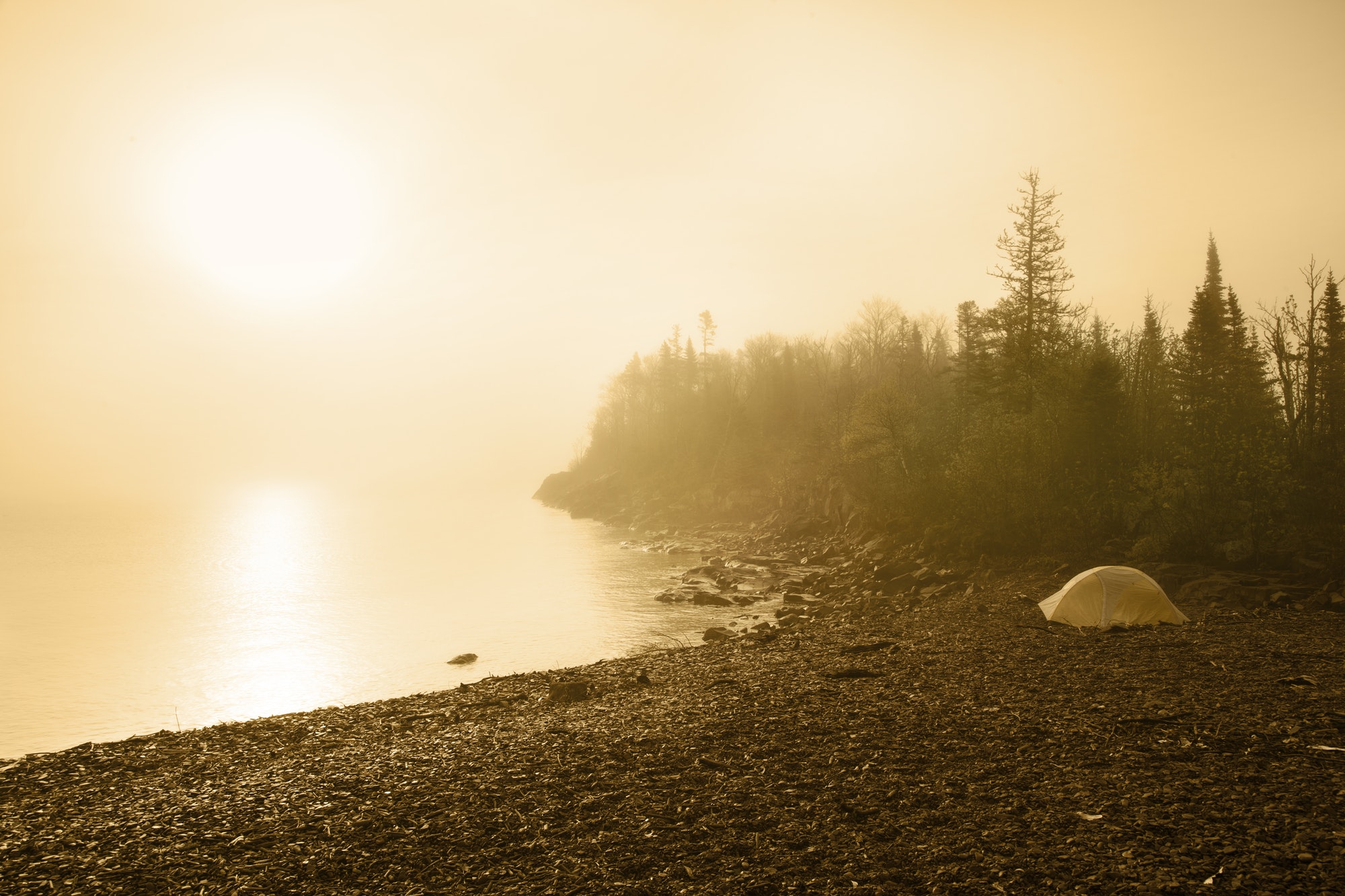 Camping Tent on Beach of Lake Superior with Sun and Mist