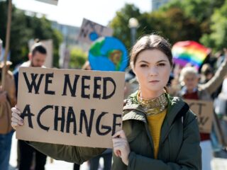 People with placards and posters on global strike for climate change.