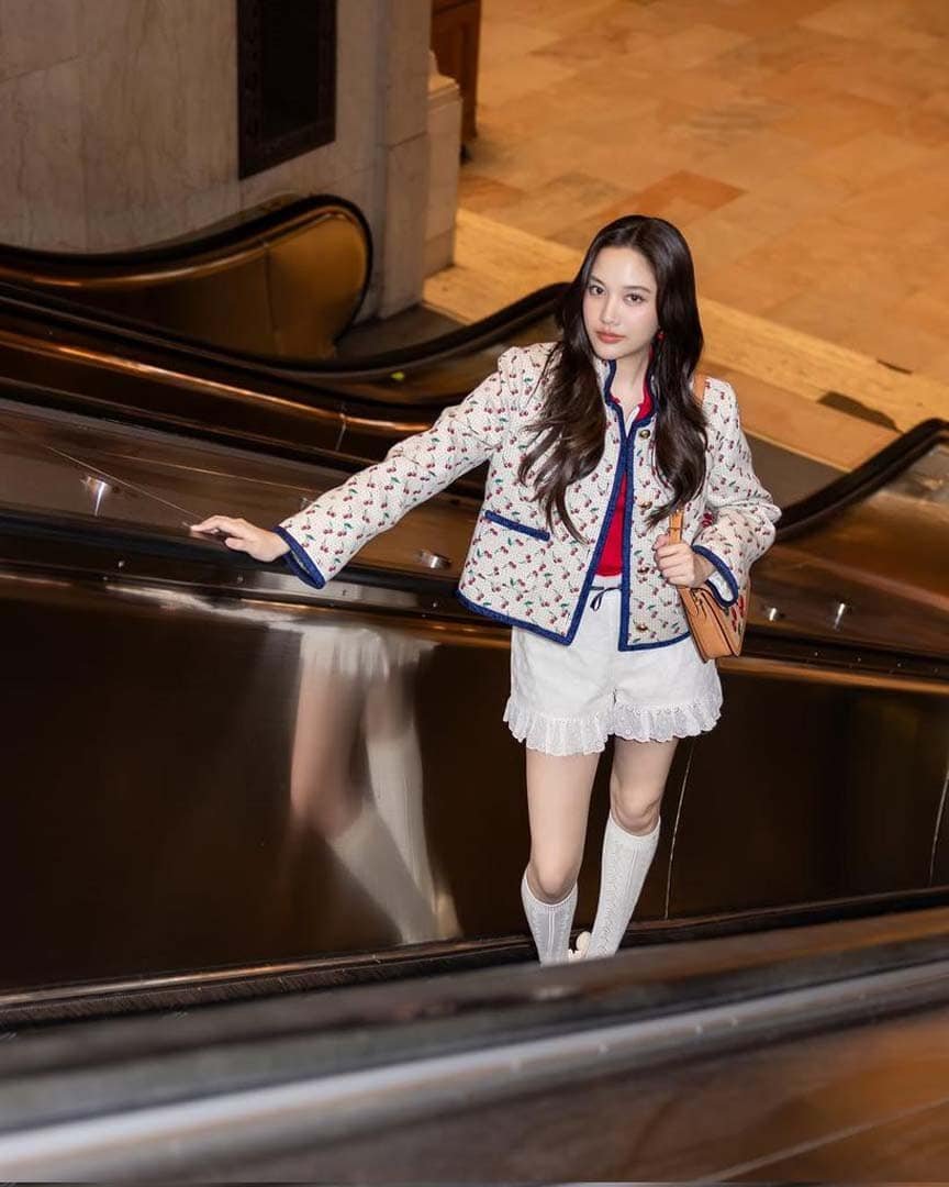 Freen Chankimha, Valentino brand ambassador, poses in an elegant Valentino outfit during a fashion event in New York City.