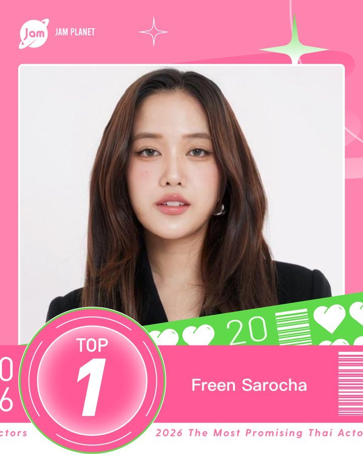 Freen Sarocha smiling and holding her Jam Planet 2026 Most Promising Thai Actors award, wearing a stylish outfit on stage with soft lighting behind her and the event logo visible in the background.