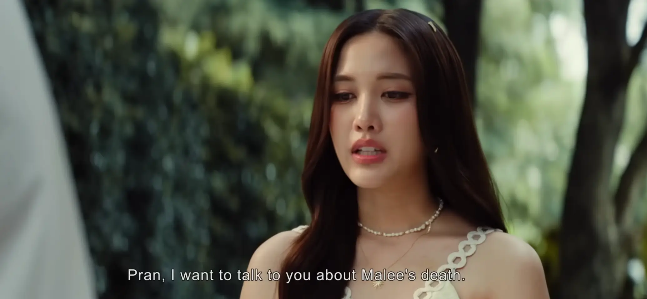 Movie poster for The Stain (2026) featuring Freen Sarocha as Namsai alongside co-stars like Apo Nattawin and Engfa Waraha, styled with dramatic, eerie visuals that reflect the film’s supernatural mystery and psychological intensity