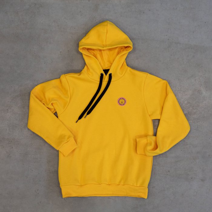 Yellow hoodie with FUERST WIACEK brewery emblem, casual apparel, stylish sweatshirt, branded clothing, comfortable streetwear.