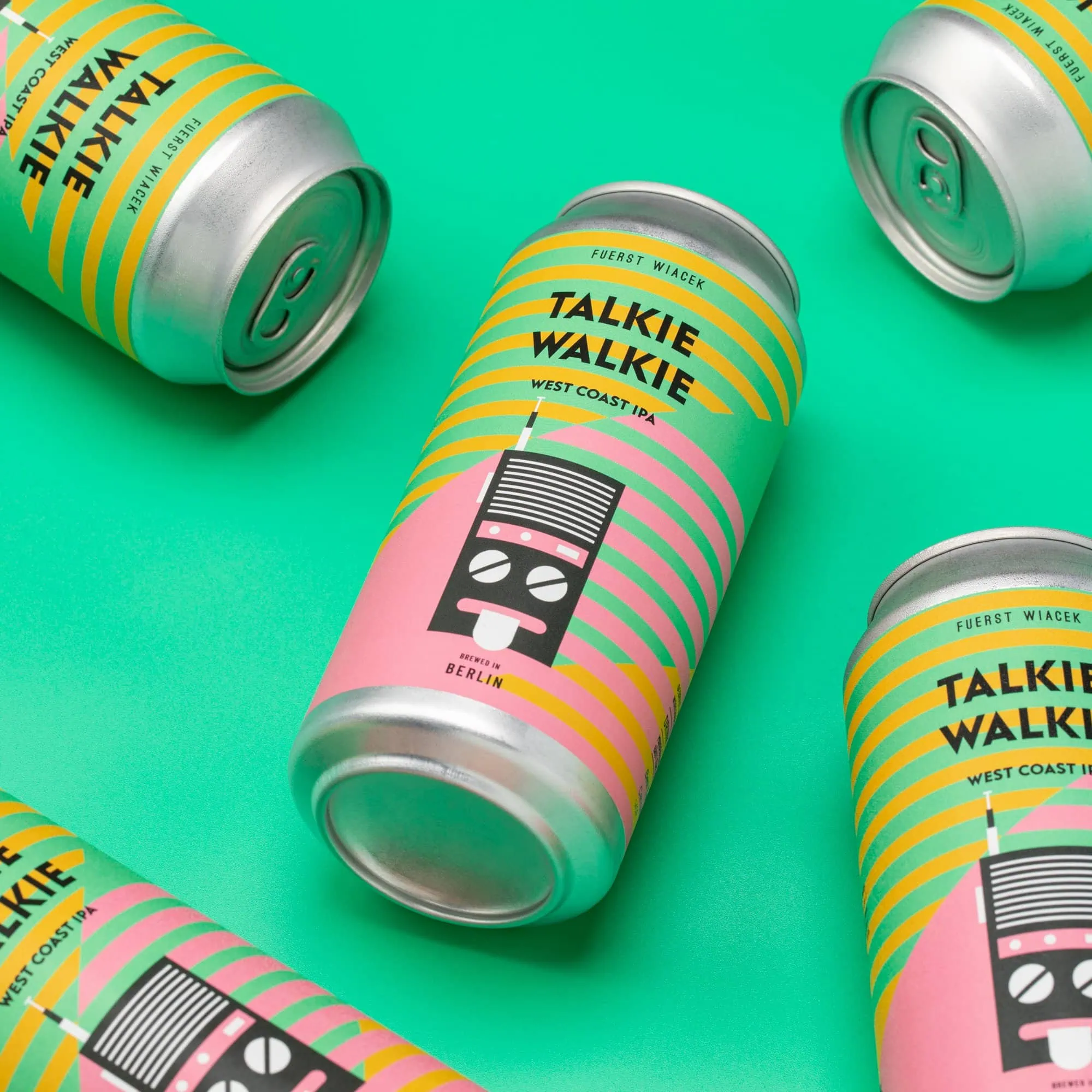 Refreshing canned beer packaging for FUERST WIACEK Brewery's Talkie Walkie West Coast IPA on a vibrant turquoise background.
