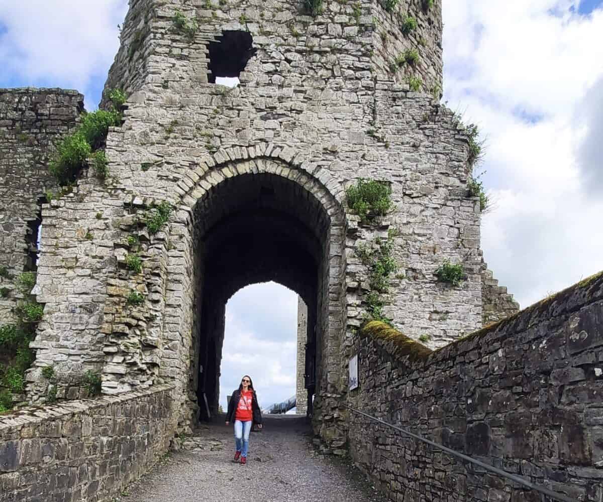 Private Day Tour. Castle main gate lady walking out of the castle gate former prison dungeon now opw office