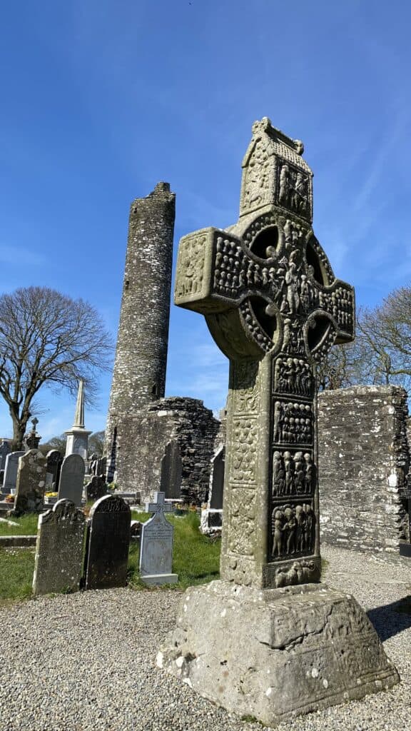 Monasterboice high cross and round tower in County Louth. Private day tour from Dublin to Newgrange