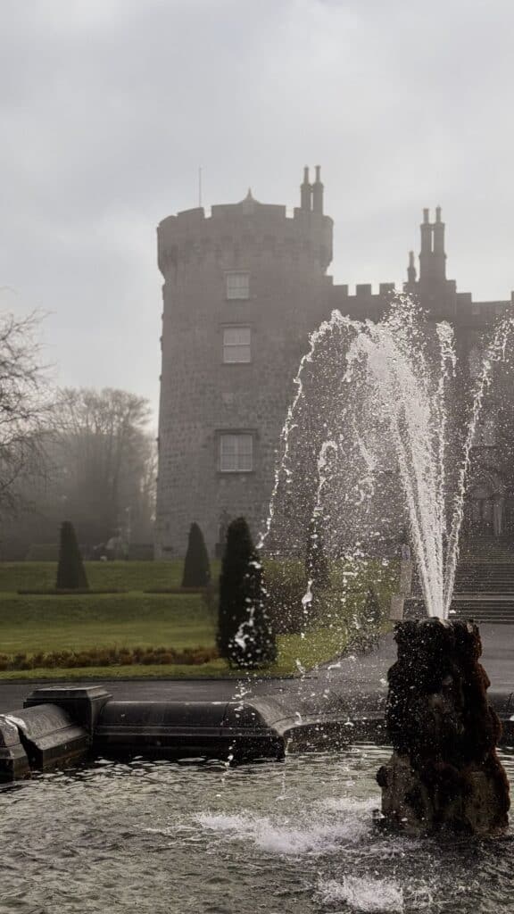 Kilkenny Castle tower with fountain in foreground