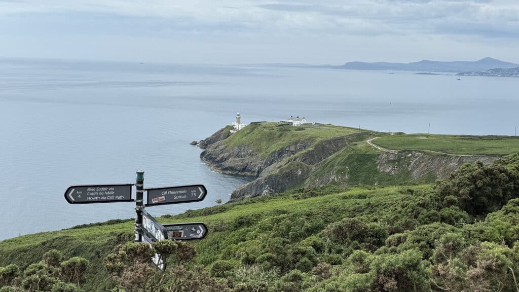 Baily Lighthouse view from the Howth Cliff Path on a private tour from Dublin