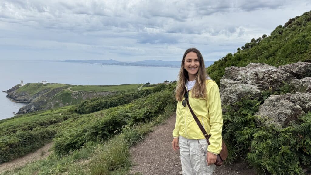 Visitor on Howth Head with Dublin Bay views during a private tour from Dublin