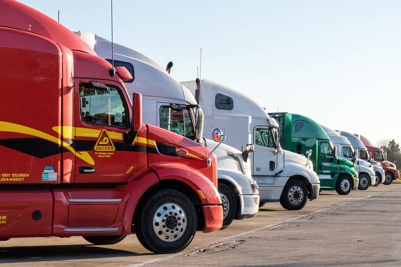 Commercial tractor trailers parked at a trucking lot in Massachusetts