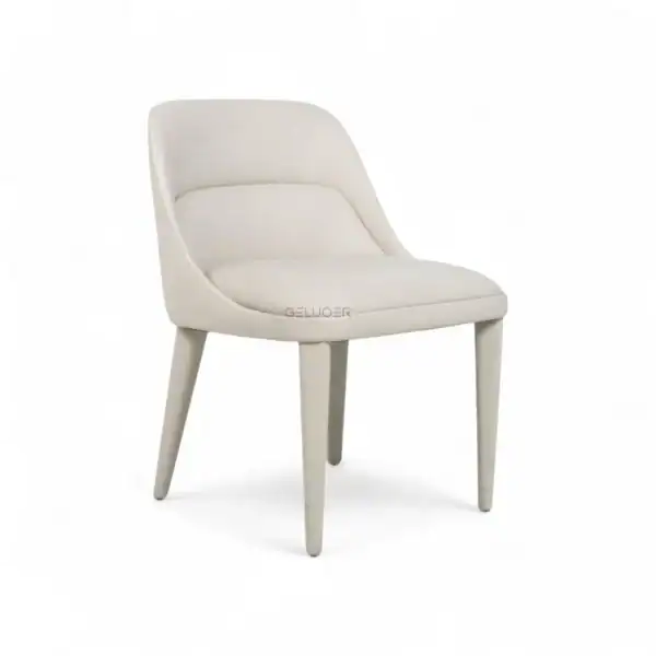 Elegant white modern dining chair, upholstered with comfortable cushioning, perfect for contemporary home decor.