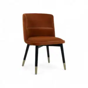 Elegant brown velvet dining chair with black and gold tapered legs, modern furniture design.