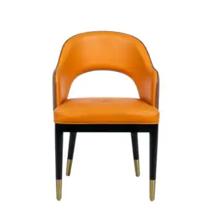 Luxurious orange leather dining chair with black and gold legs by Geluoer Furniture.