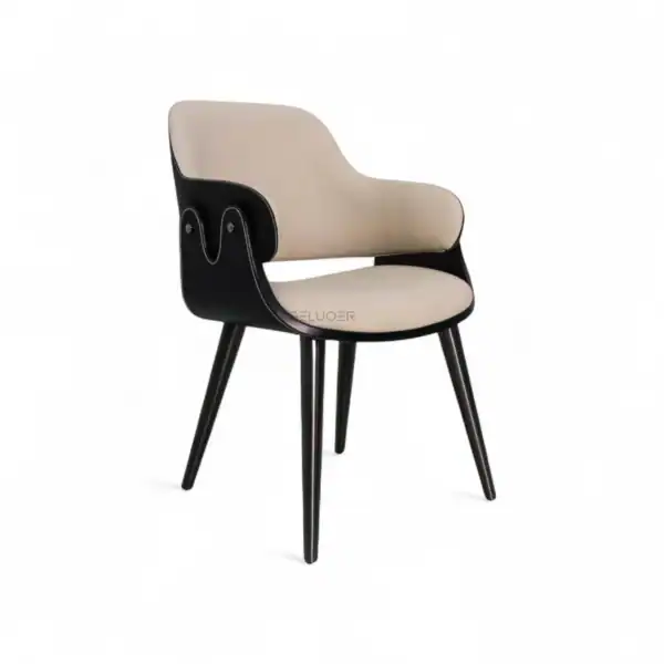 Contemporary accent chair with beige and black upholstery, wooden legs, modern design furniture.