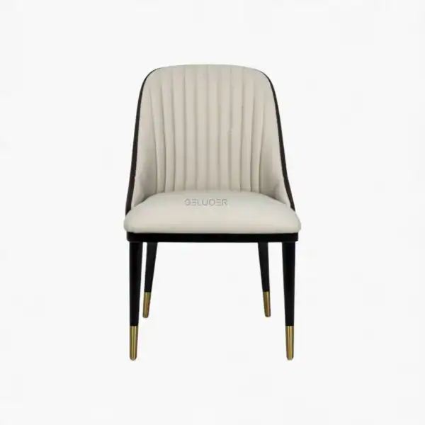 Luxury modern dining chair with black gold accents, upholstered in high-quality white leather, stylish design.