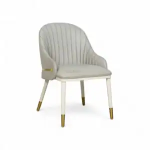 Elegant white upholstered accent chair with gold accents for modern living rooms.