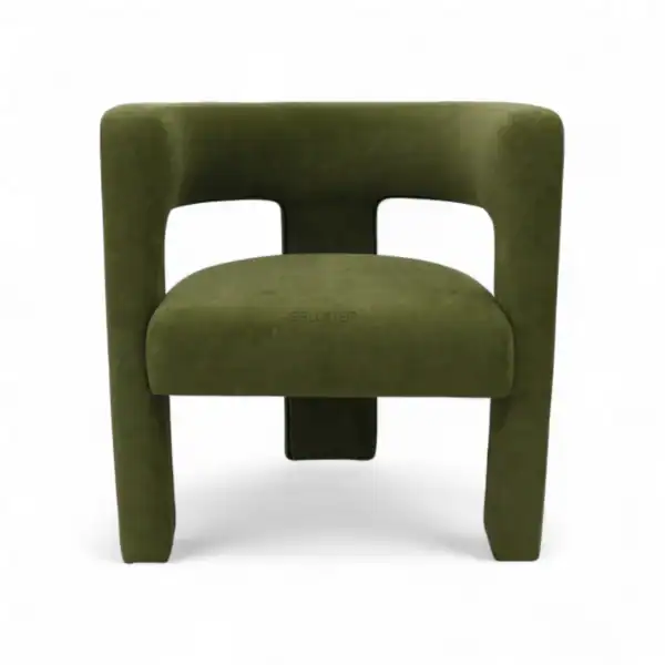 Sustainable green velvet modern armchair with bold geometric design.