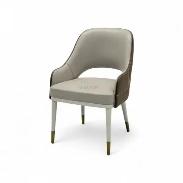 Luxurious modern armchair with beige and brown leather, stylish wooden legs, perfect for elegant home decor.