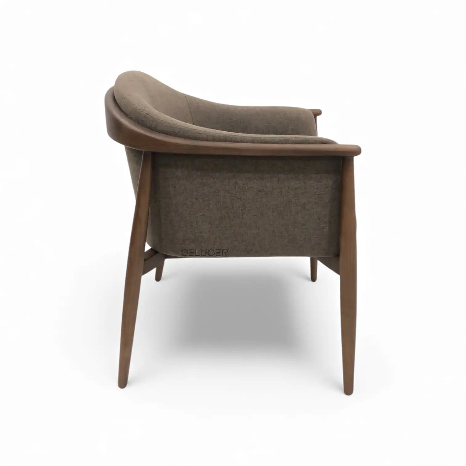 Comfortable modern armchair with wooden frame and plush fabric upholstery for stylish living spaces.