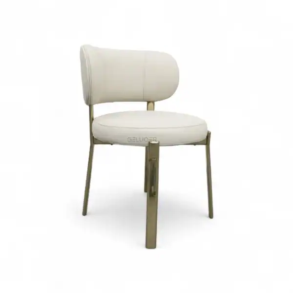 Elegant modern white upholstered lounge chair with gold metal legs, perfect for contemporary home decor.