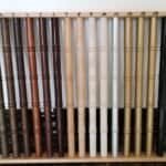 Wooden furniture legs in various finishes for custom furniture design.