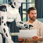 Advanced robotic assistant collaborating with a man in a modern office environment.