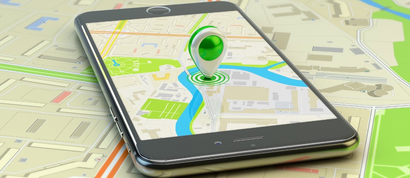 GPS navigation app on smartphone with map and location marker.