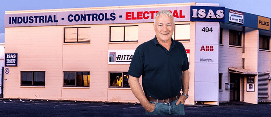 High-tech industrial building with controls and electrical equipment in the background.
