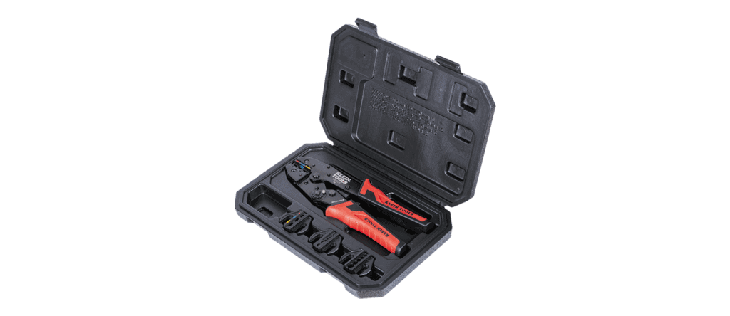 Precision screwdriver set with red and black handles in a black plastic case.