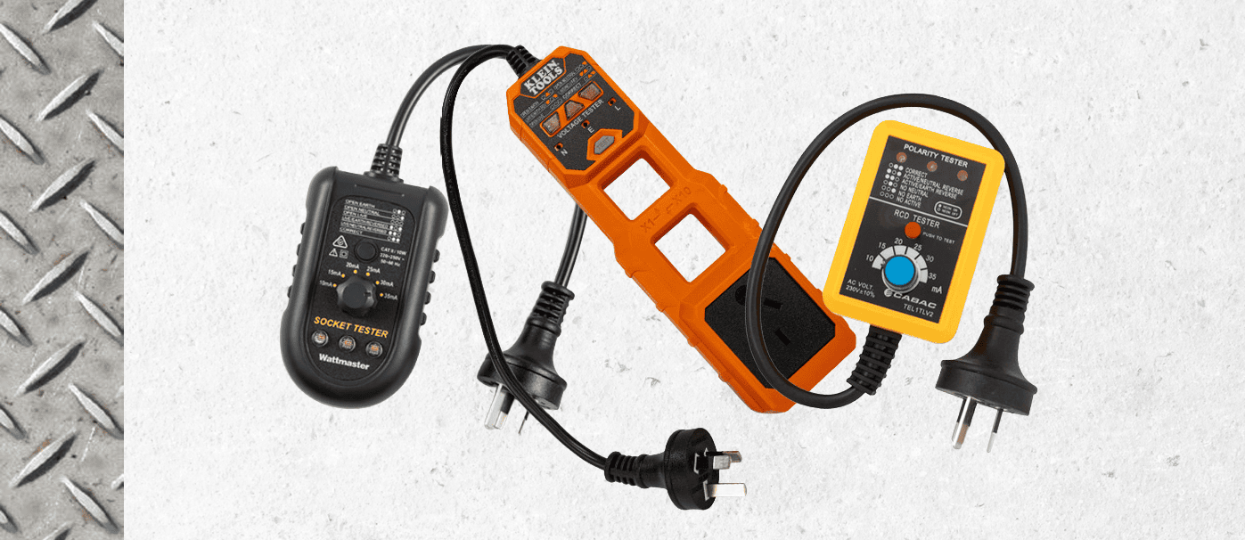 Earth leakage tester with orange and black casing, used for electrical safety inspections.